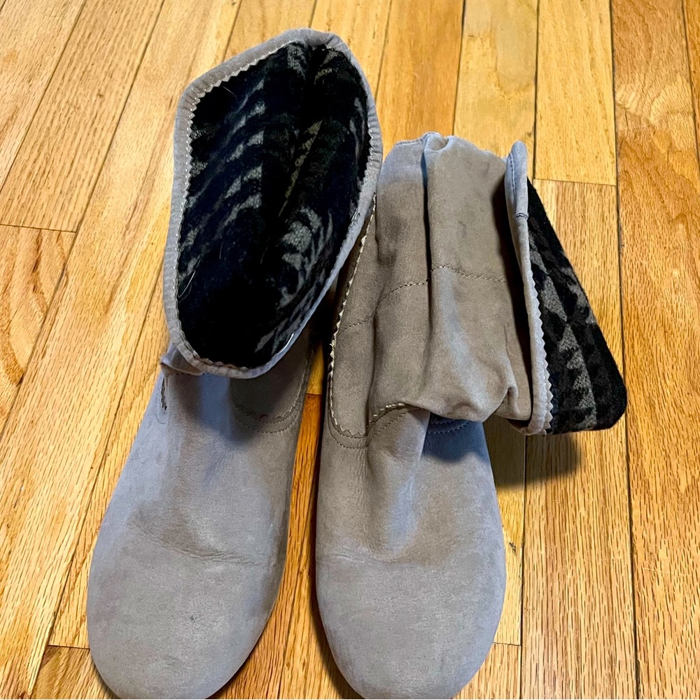 Tan booties. Like new! Still have the sticker in the sole!